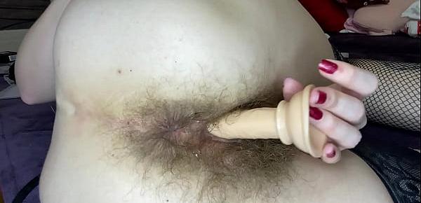  Hairy girl fucks her wet big clit pussy with dildo in close up